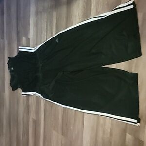 Adidas one peice track suit sz med blk & whit